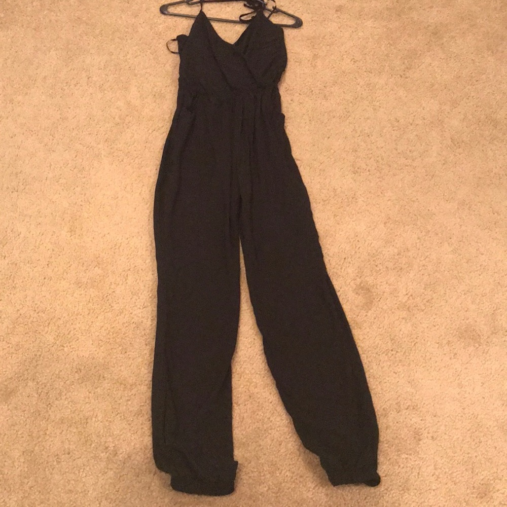 Black jumpsuit. Never worn.